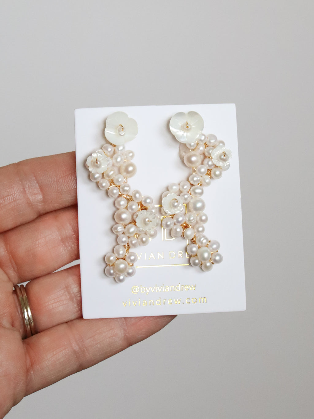 Falling Pearl Clusters