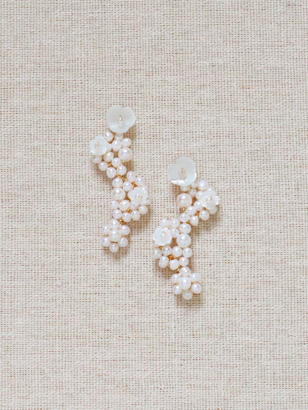 Falling Pearl Clusters