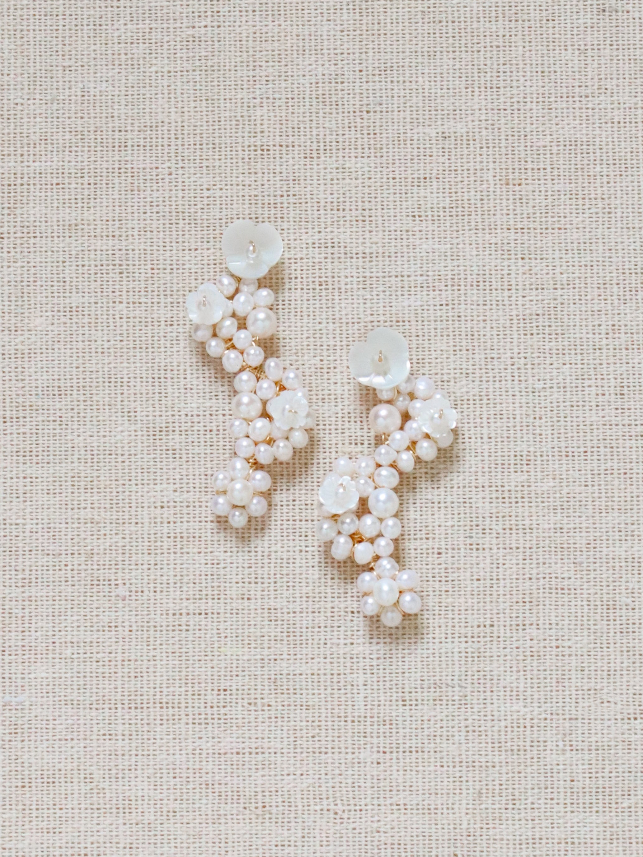 Falling Pearl Clusters