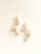 Falling Pearl Clusters